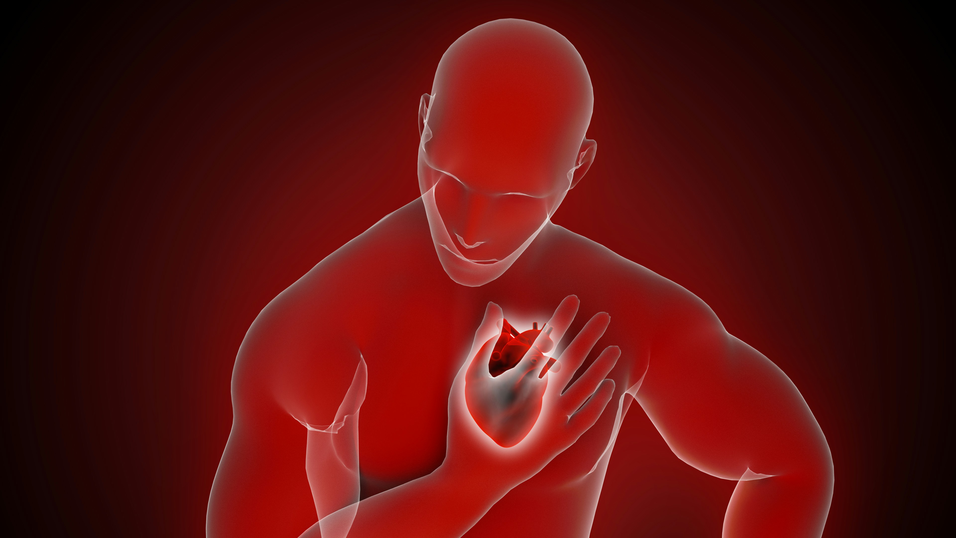 A man suffering from a pain in the chest and heart